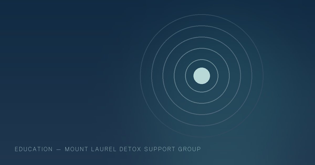 Illustration in the site's navy and teal palette showing a steady beacon of light inside a calm dark field, marking this guide to Signs of Opioid Addiction.